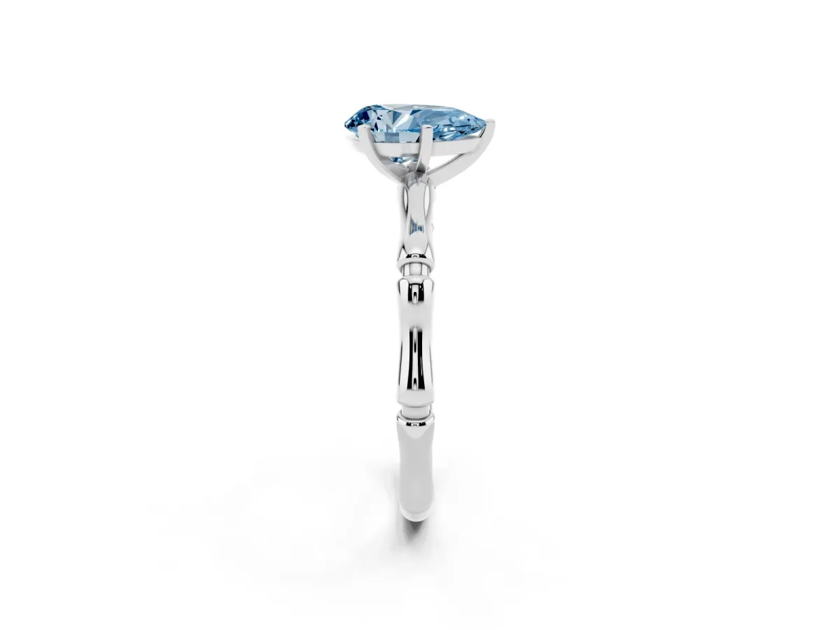 Fancy Blue Pear Cut Solitaire Diamond Ring with Bamboo Band and Four-Prong Setting Platinum
