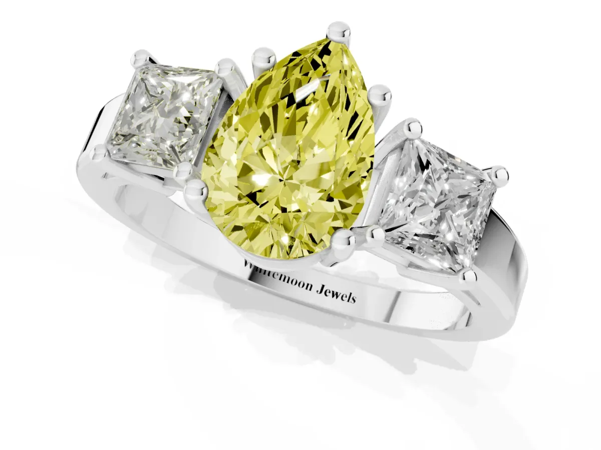 Fancy Yellow Three-Stone Pear Cut Cut Solitaire Ring with Prong Setting Platinum