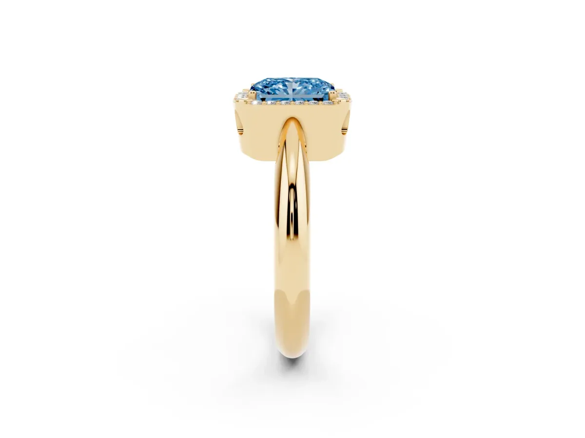 Fancy Blue Radiant Cut Cut Diamond Halo Engagement Ring with Split Shank and Four-Prong Setting Yellow gold