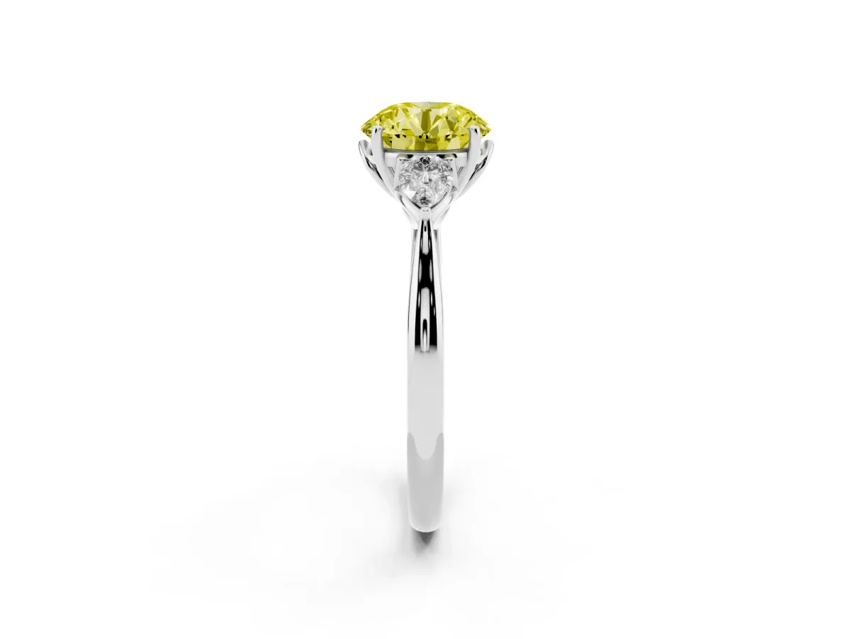 Fancy Yellow Three-Stone Round Cut Diamond Ring with Pear Side Stones in Four-Prong Setting Platinum
