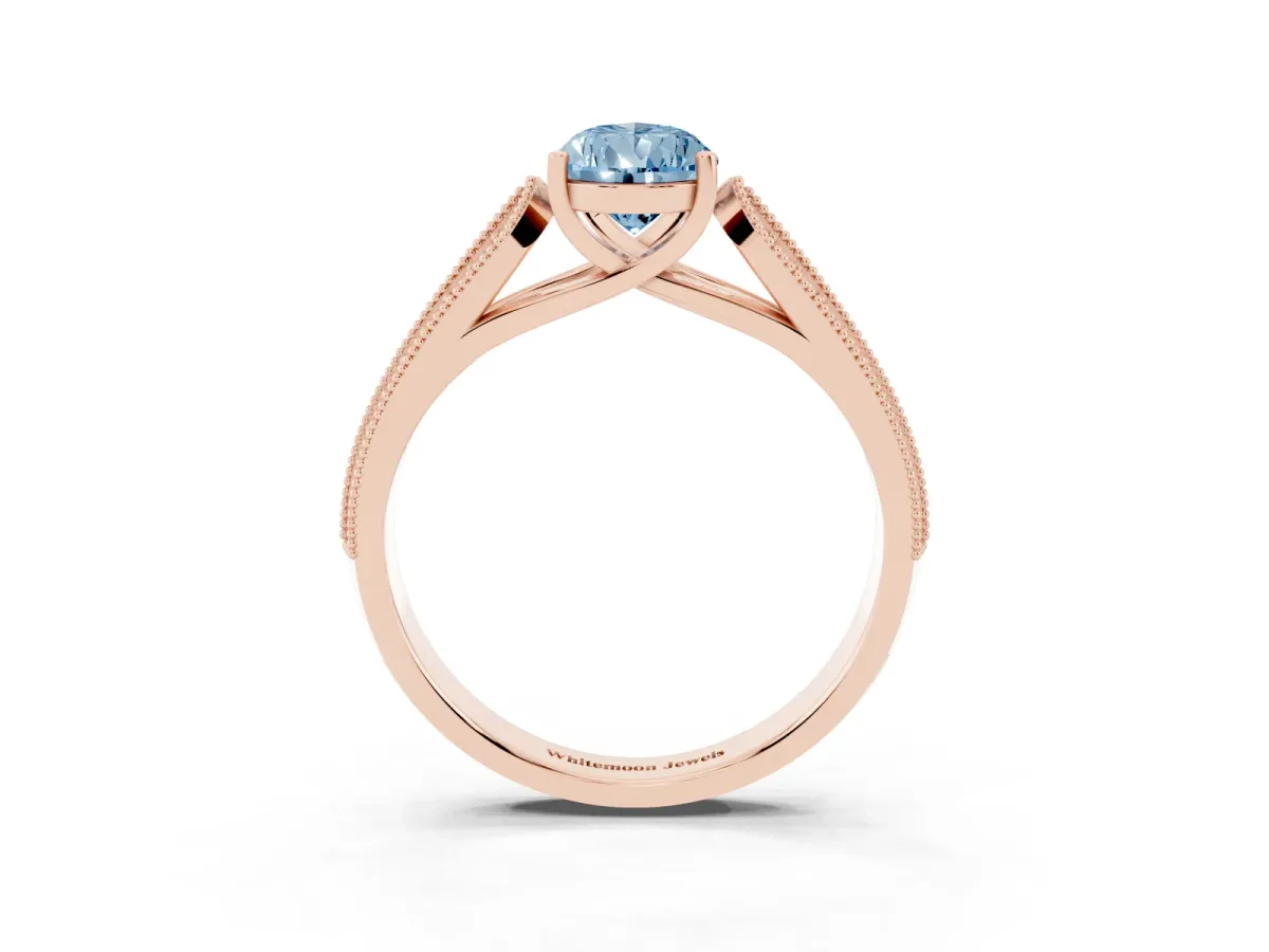 Fancy Blue Pear Cut Cut Pave Split Shank Engagement Ring with Four-Prong Setting Rose gold