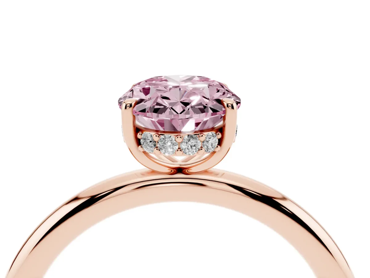 Fancy Pink Oval Cut Diamond Solitaire Ring with Thin Band and Four-Prong Setting Rose gold