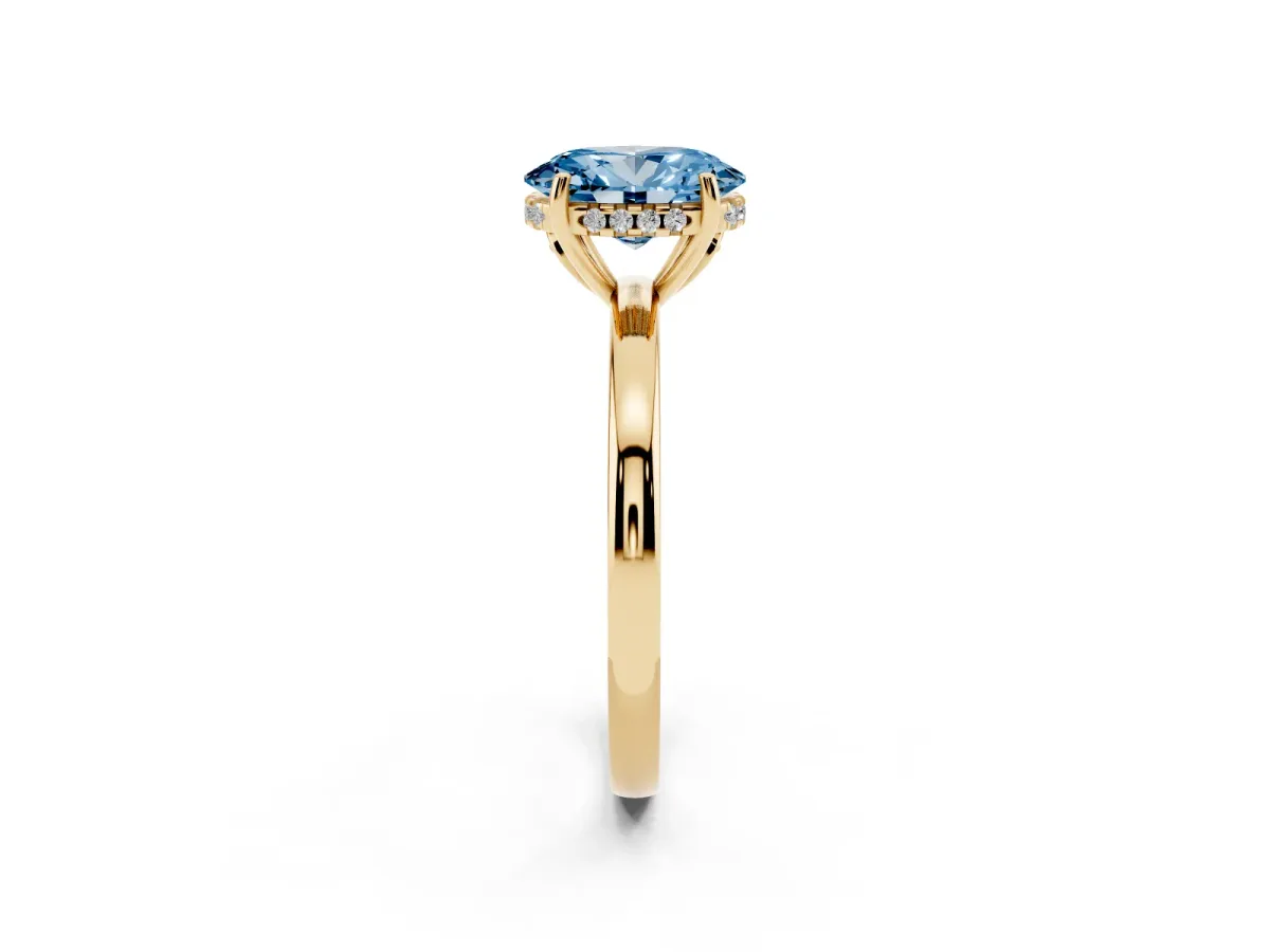 Fancy Blue Oval Cut Solitaire Diamond Ring with Prong Setting and Plain Band Yellow gold