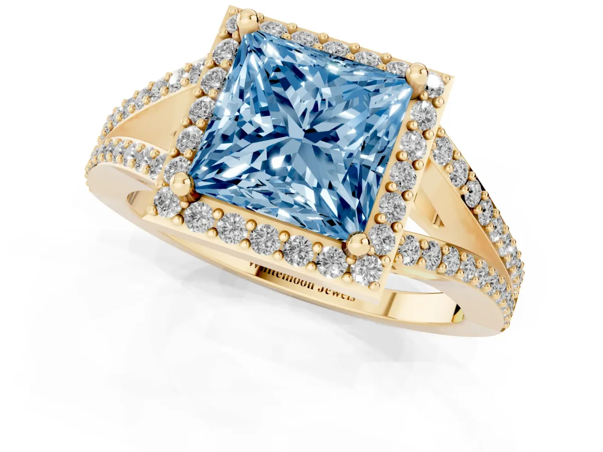 Fancy Blue Princess Cut Halo Split Shank Diamond Ring with Prong Setting Yellow gold