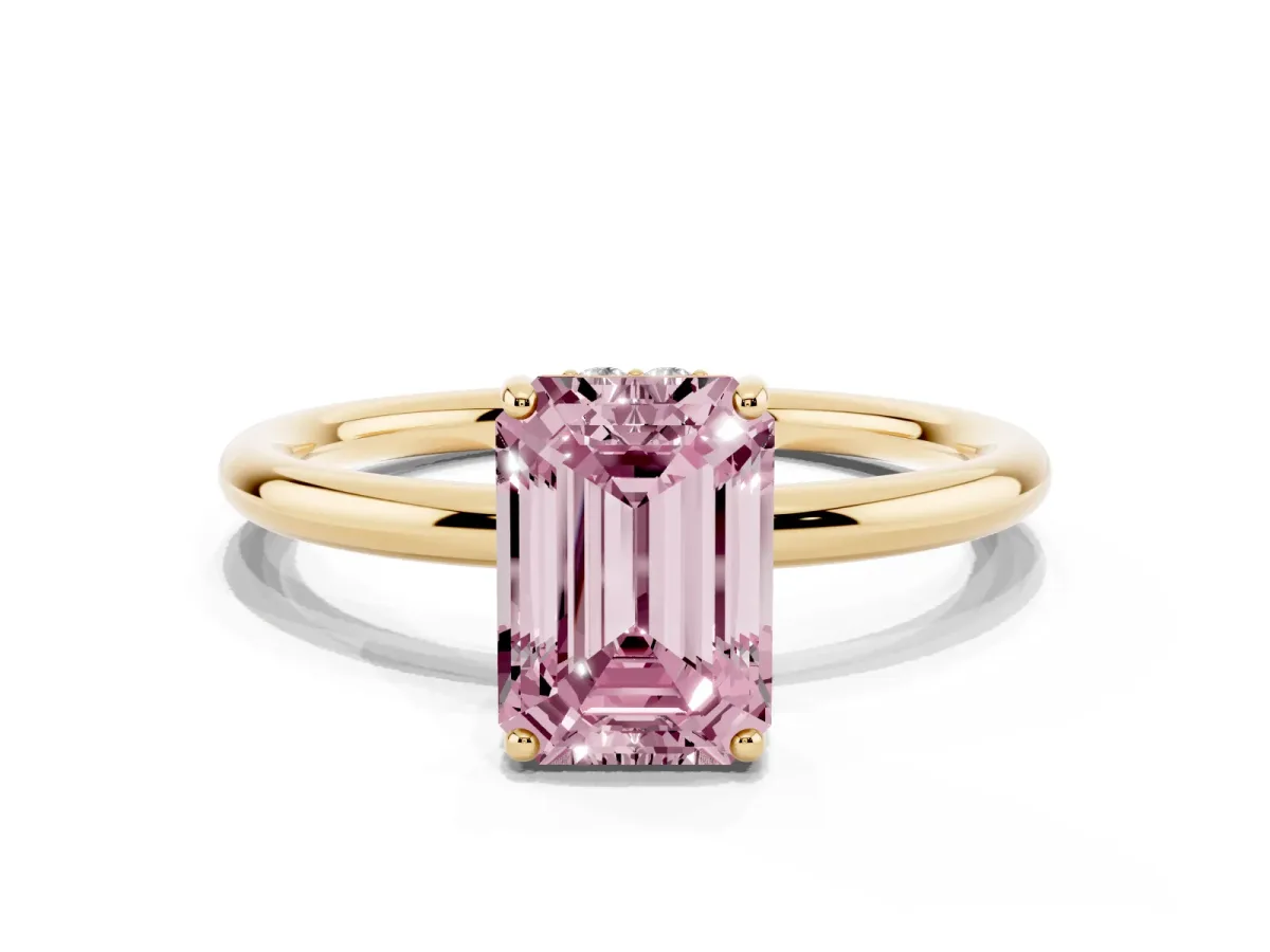 Fancy Pink Emerald Cut Solitaire Diamond Ring with a Classic Band and Four-Prong Setting Yellow gold