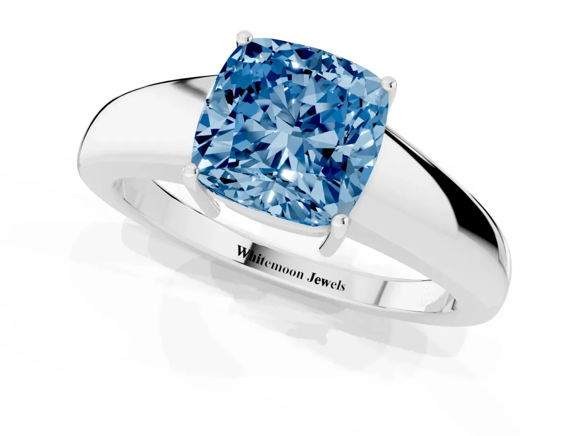 Fancy Blue Cushion Cut Solitaire Diamond Ring with Tapered Band and Four-Prong Setting Platinum