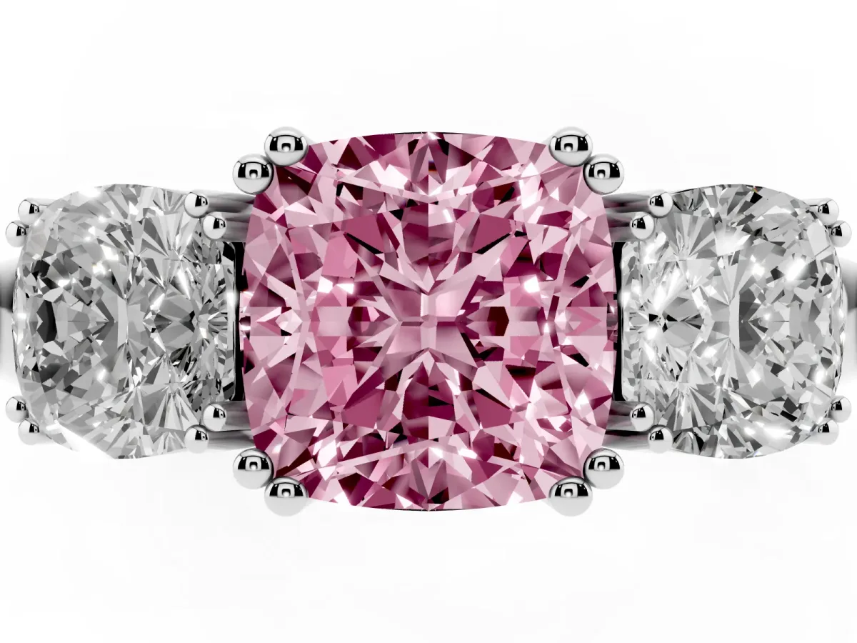 Fancy Pink Three-Stone Cushion Cut Cut Diamond Ring with Channel Set Band and Four-Prong Setting Platinum