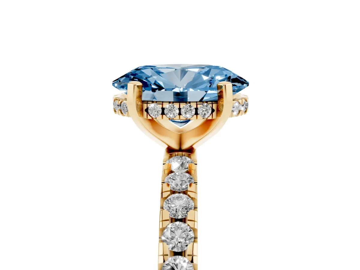Fancy Blue Oval Cut Diamond Solitaire Ring with Round Pavé Band and Four-Prong Setting Yellow gold