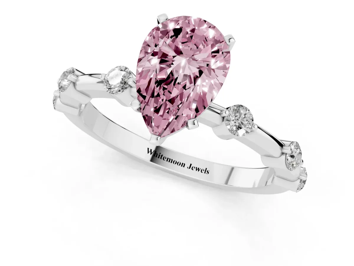 Fancy Pink Pear Cut Solitaire Diamond Ring with Bezel Set Side Stones and Prong Setting Silver