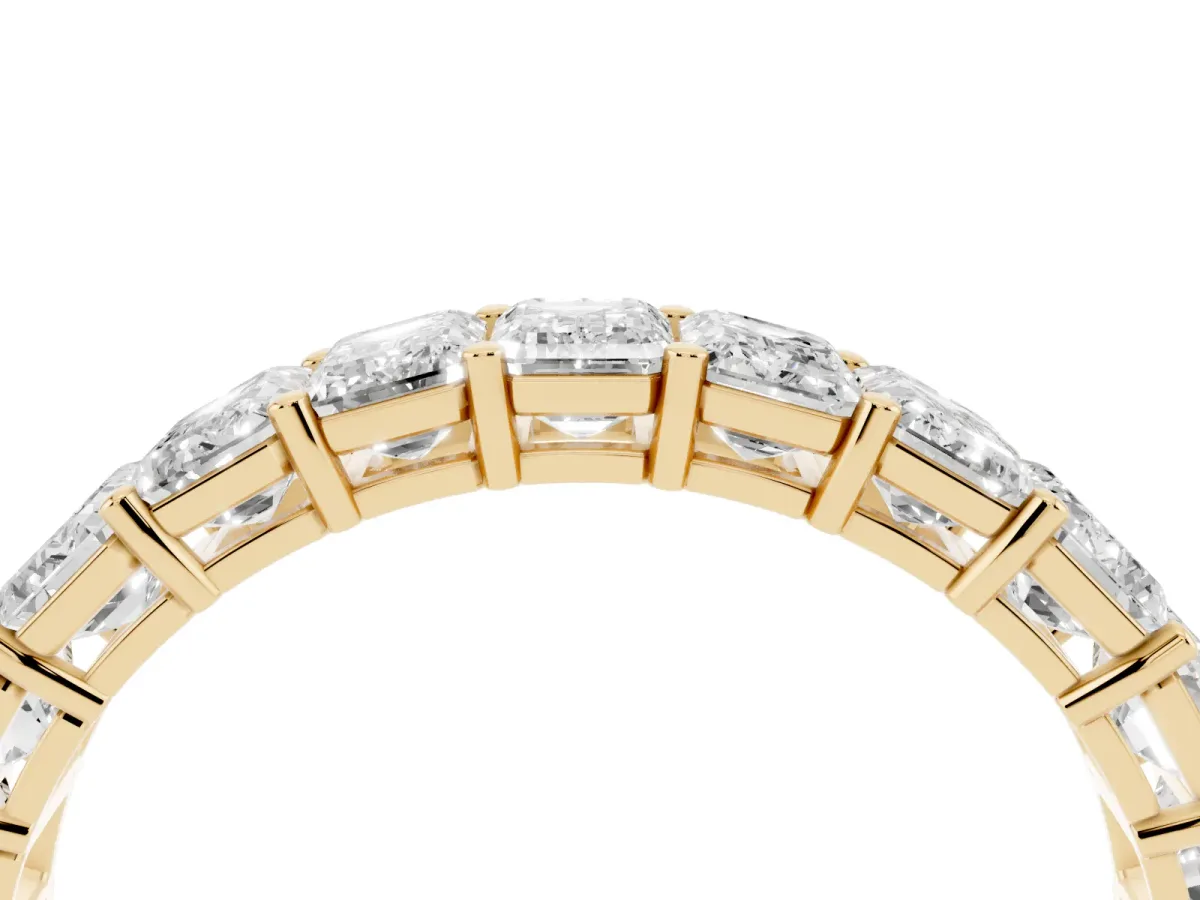 Emerald Cut Diamond Eternity Band with Shared Prong Setting Yellow gold