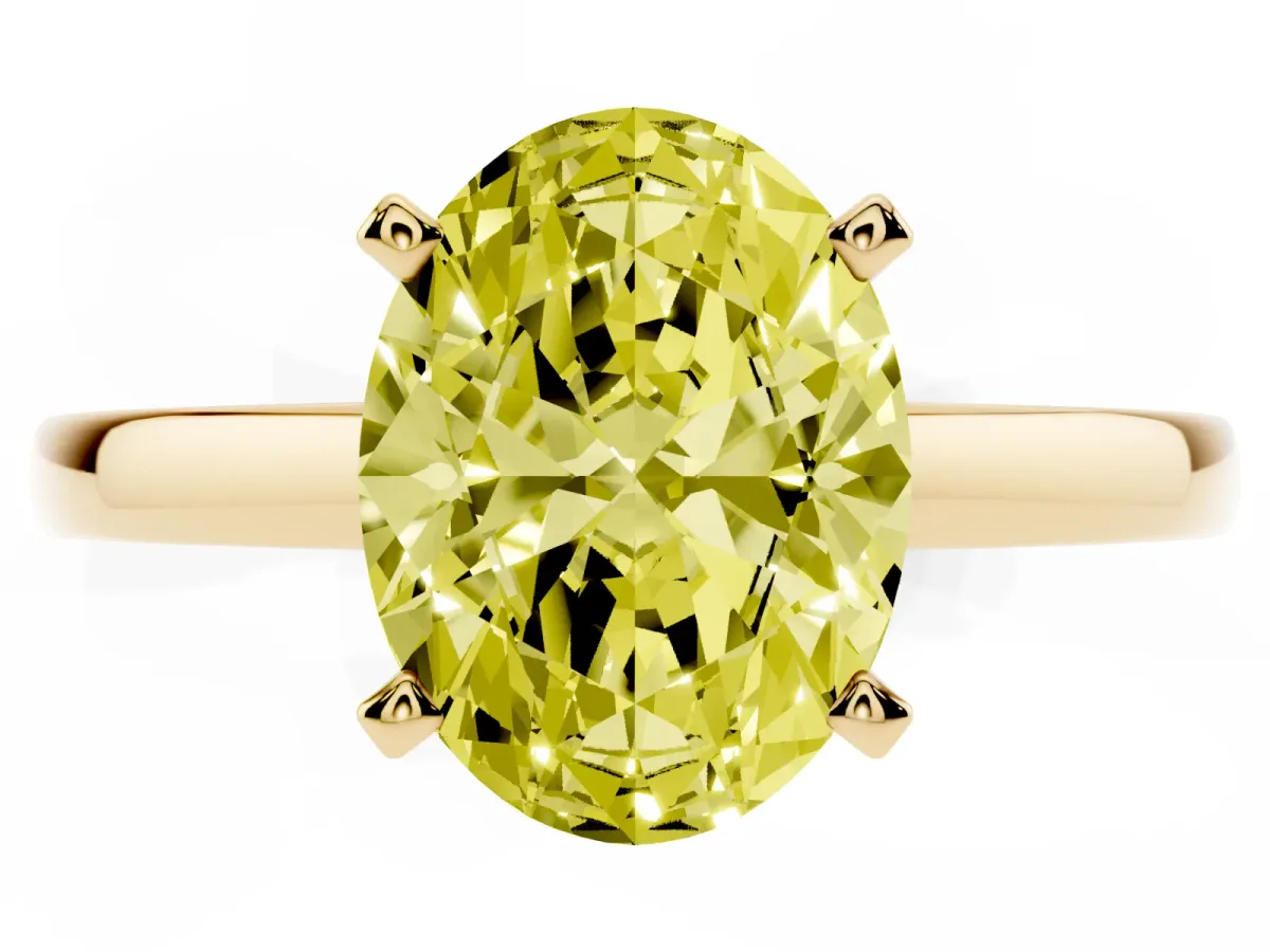 Fancy Yellow Oval Cut Solitaire Diamond Engagement Ring with Four-Prong Setting on a Classic Band Yellow gold