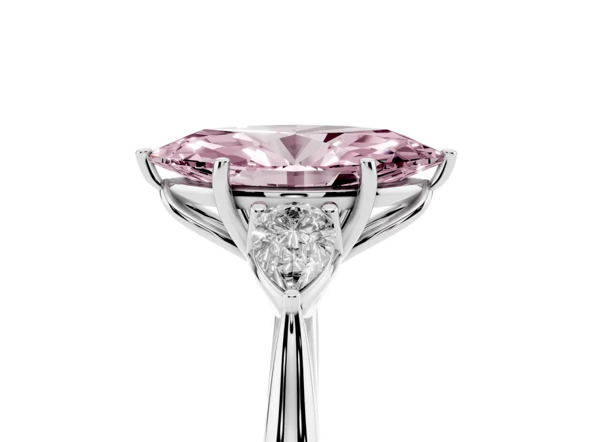 Fancy Pink Three-Stone Marquise Cut Brilliant Diamond Solitaire Ring with Tapered Band and Four-Prong Setting Platinum