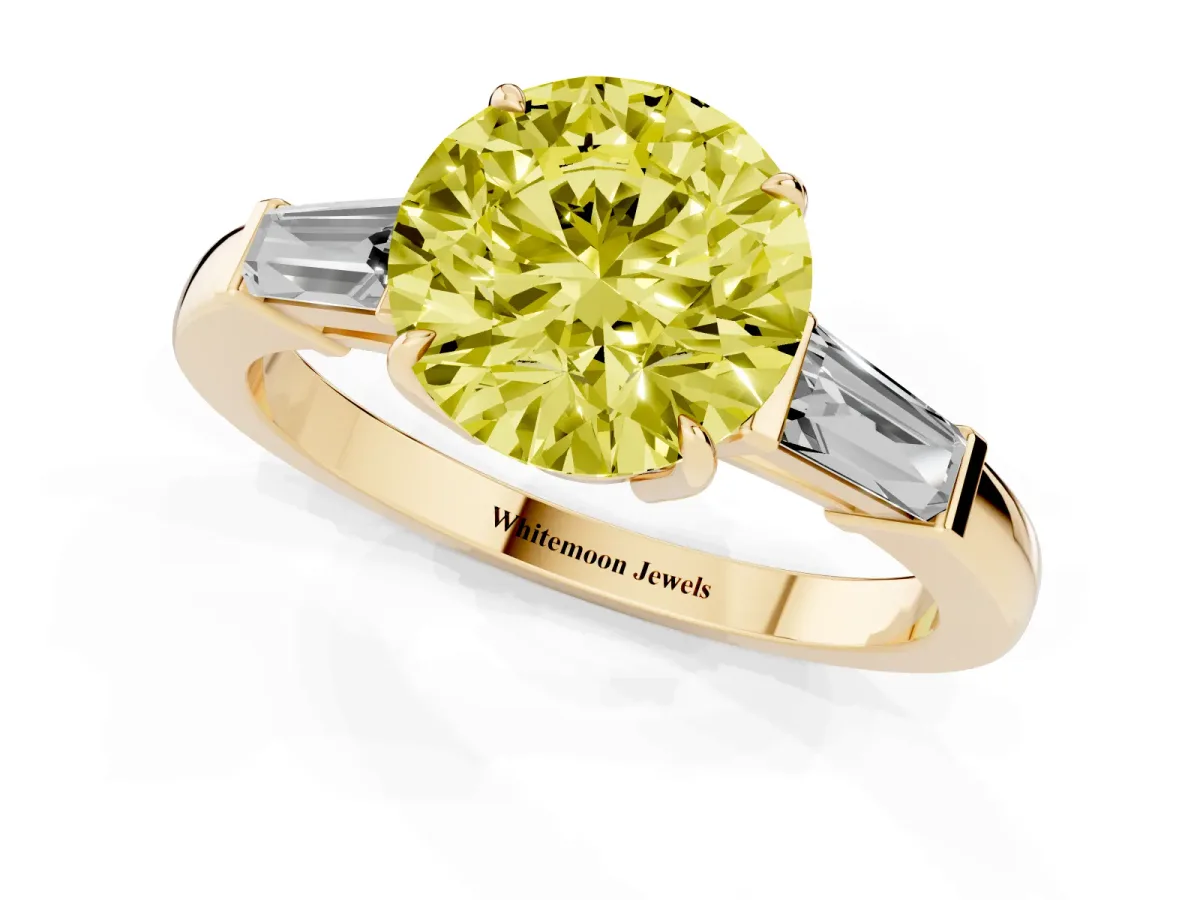 Fancy Yellow Round Cut Diamond Three-Stone Ring with Tapered Baguette Side Stones and Prong Setting Yellow gold