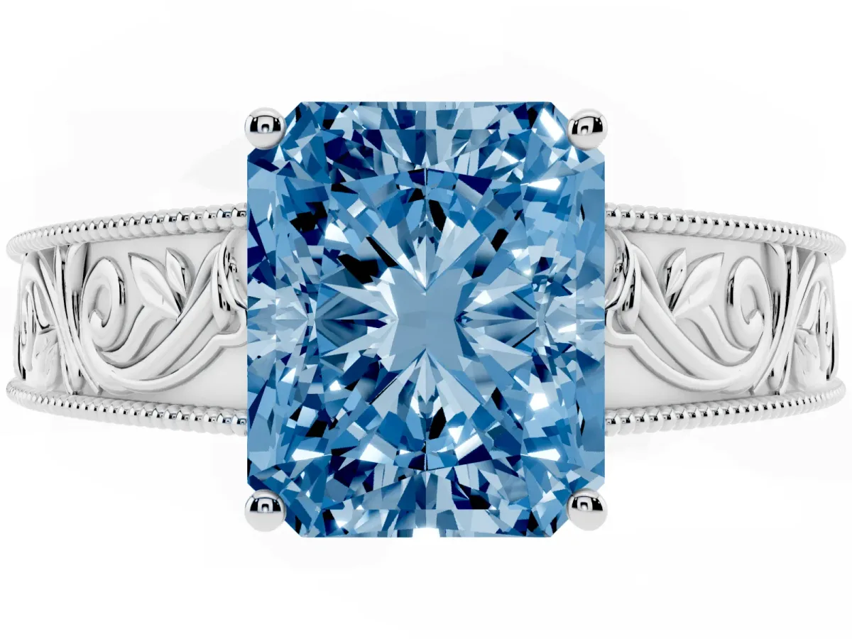 Fancy Blue Radiant Cut Diamond Solitaire Ring with Engraved Band and Four-Prong Setting White gold
