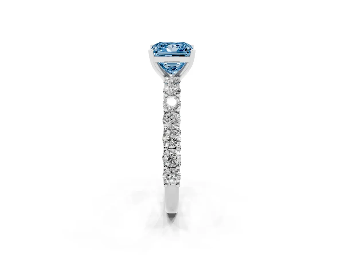 Fancy Blue Princess Cut Diamond Solitaire Ring with Shared Prong Pavé Band and Four-Prong Setting Silver