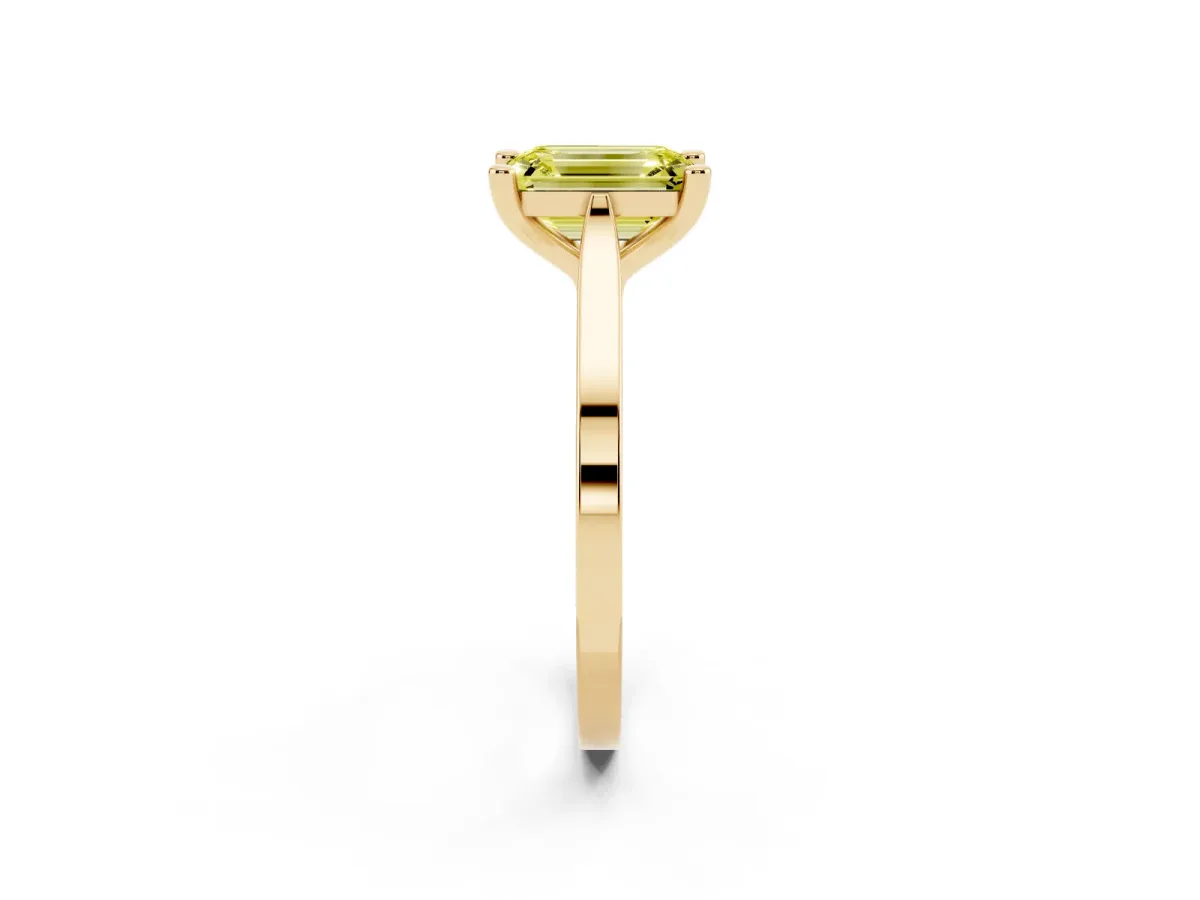 Fancy Yellow Emerald Cut Solitaire Diamond Ring with Four-Prong Setting and Tapered Band Yellow gold