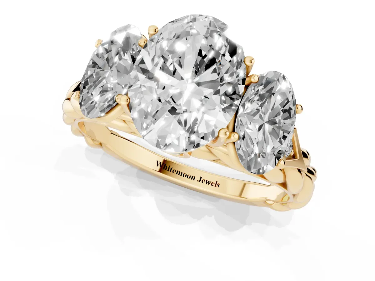 Three-Stone Oval Cut Diamond Braided Band Ring with Four-Prong Setting Yellow gold