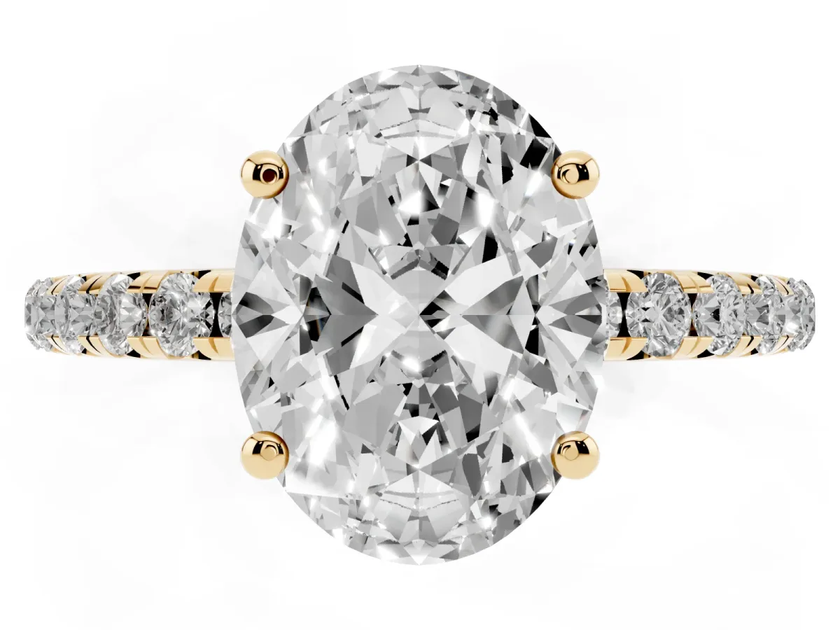 Oval Cut Cut Diamond Solitaire Ring with Micro Pave Band and Four Prong Setting Yellow gold