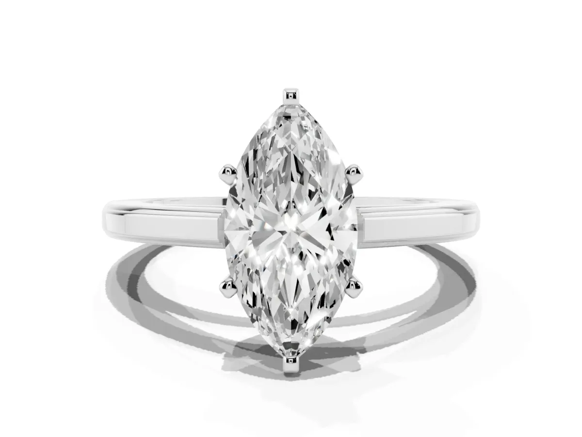Marquise Cut Solitaire Diamond Ring with Four-Prong Setting and Classic Band Silver