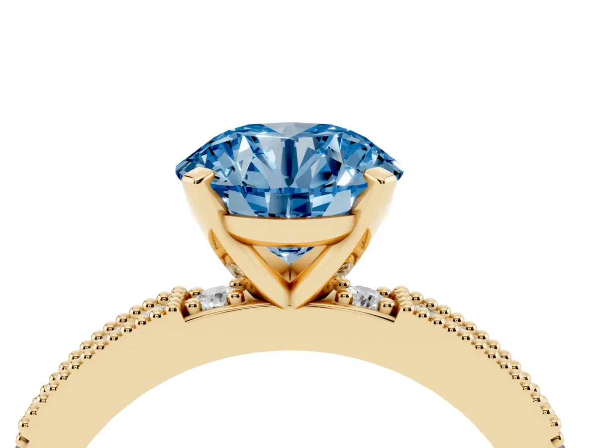 Fancy Blue Round Cut Solitaire with Pavé Band and Four-Prong Setting Yellow gold