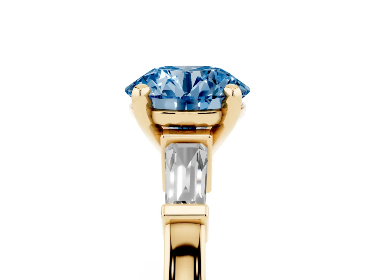 Fancy Blue Round Cut Cut Diamond Solitaire Ring with Tapered Baguette Accents and Four-Prong Setting Yellow gold