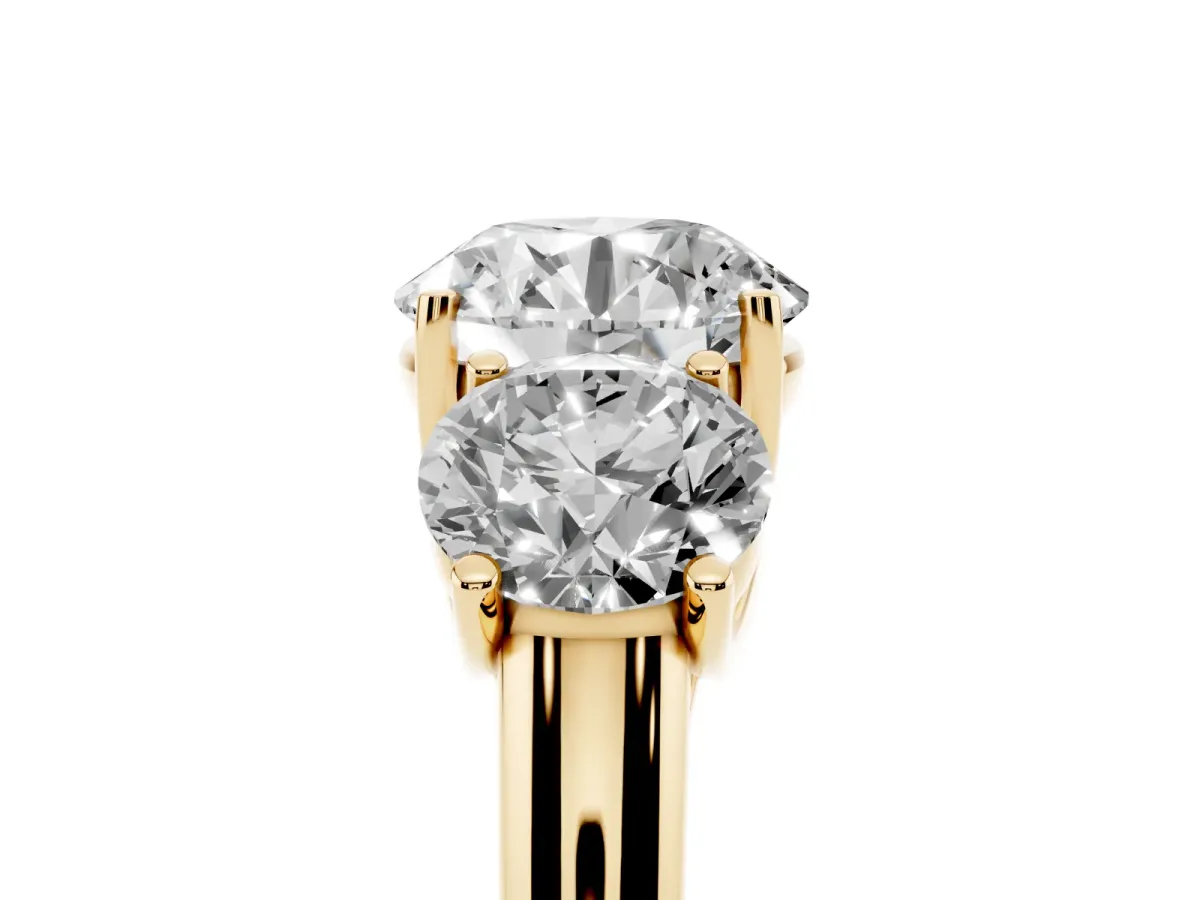 Three-Stone Round Cut Diamond Engagement Ring with Prong Setting Yellow gold