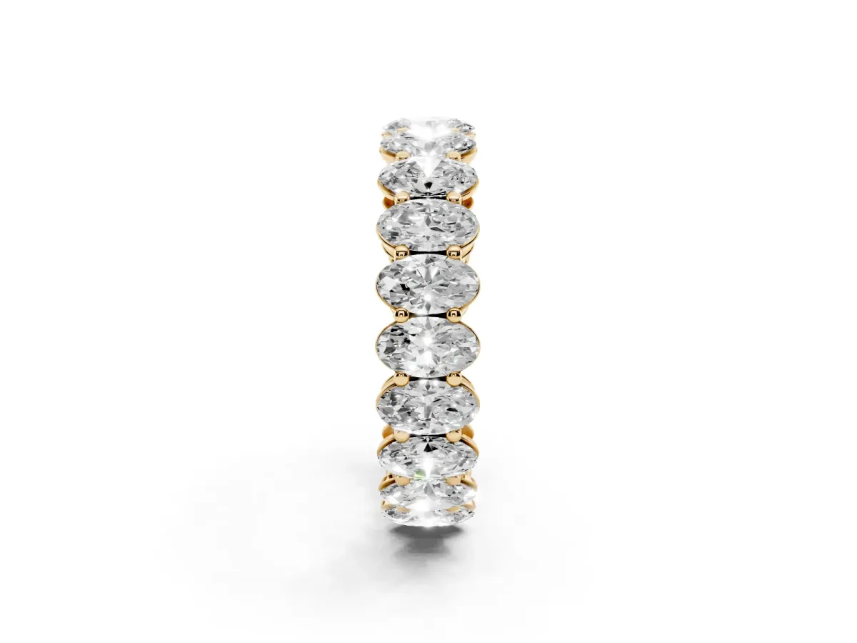 Oval Cut Diamond Eternity Band with Shared Prong Setting Yellow gold