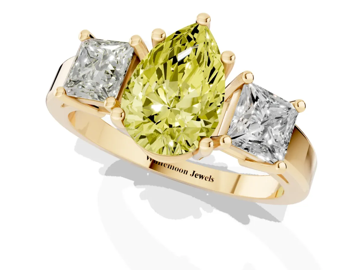 Fancy Yellow Three-Stone Pear Cut Cut Solitaire Ring with Prong Setting Yellow gold