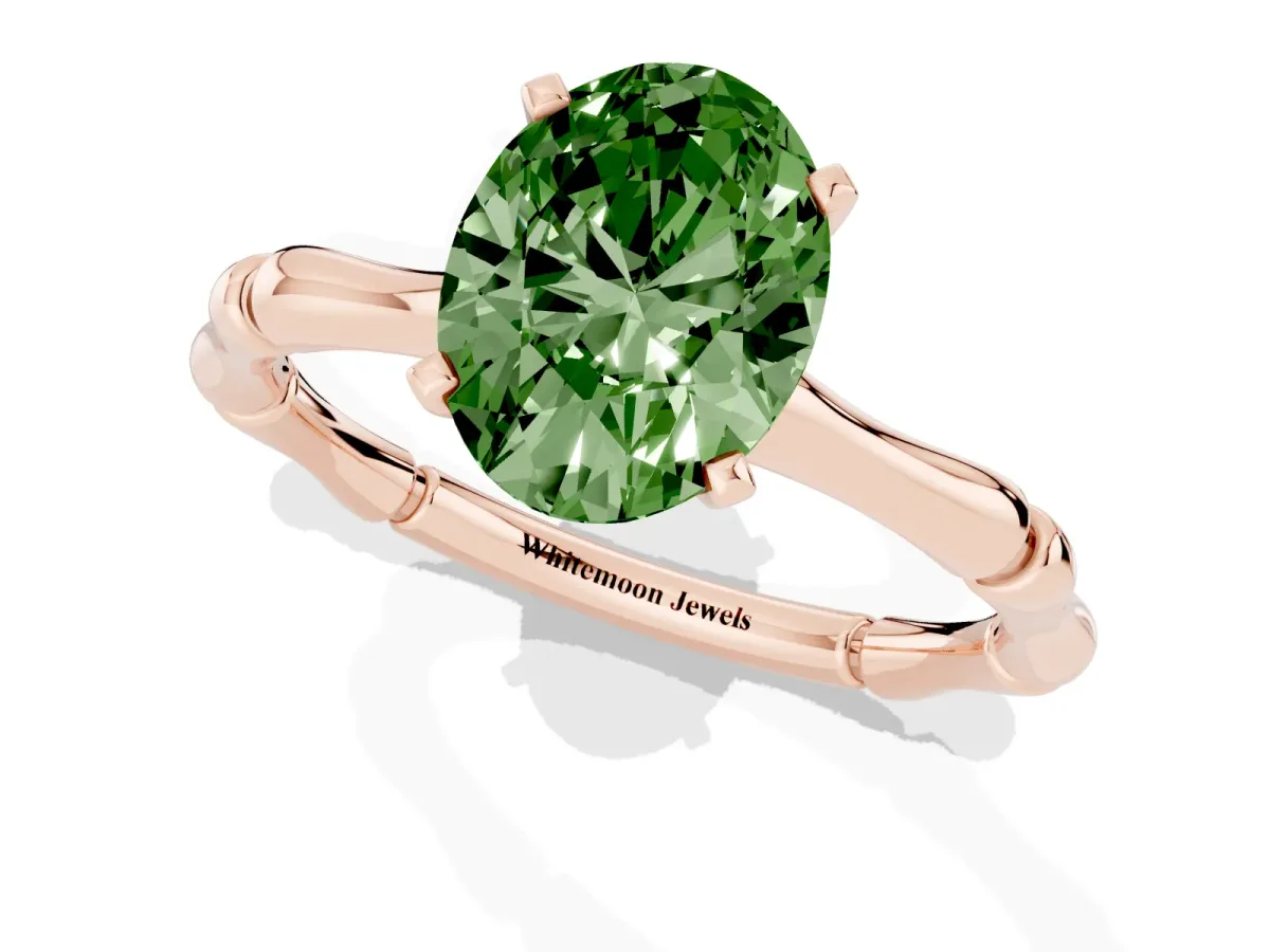 Fancy Green Oval Cut Solitaire Diamond Ring with Bamboo Band and Four-Prong Setting Rose gold