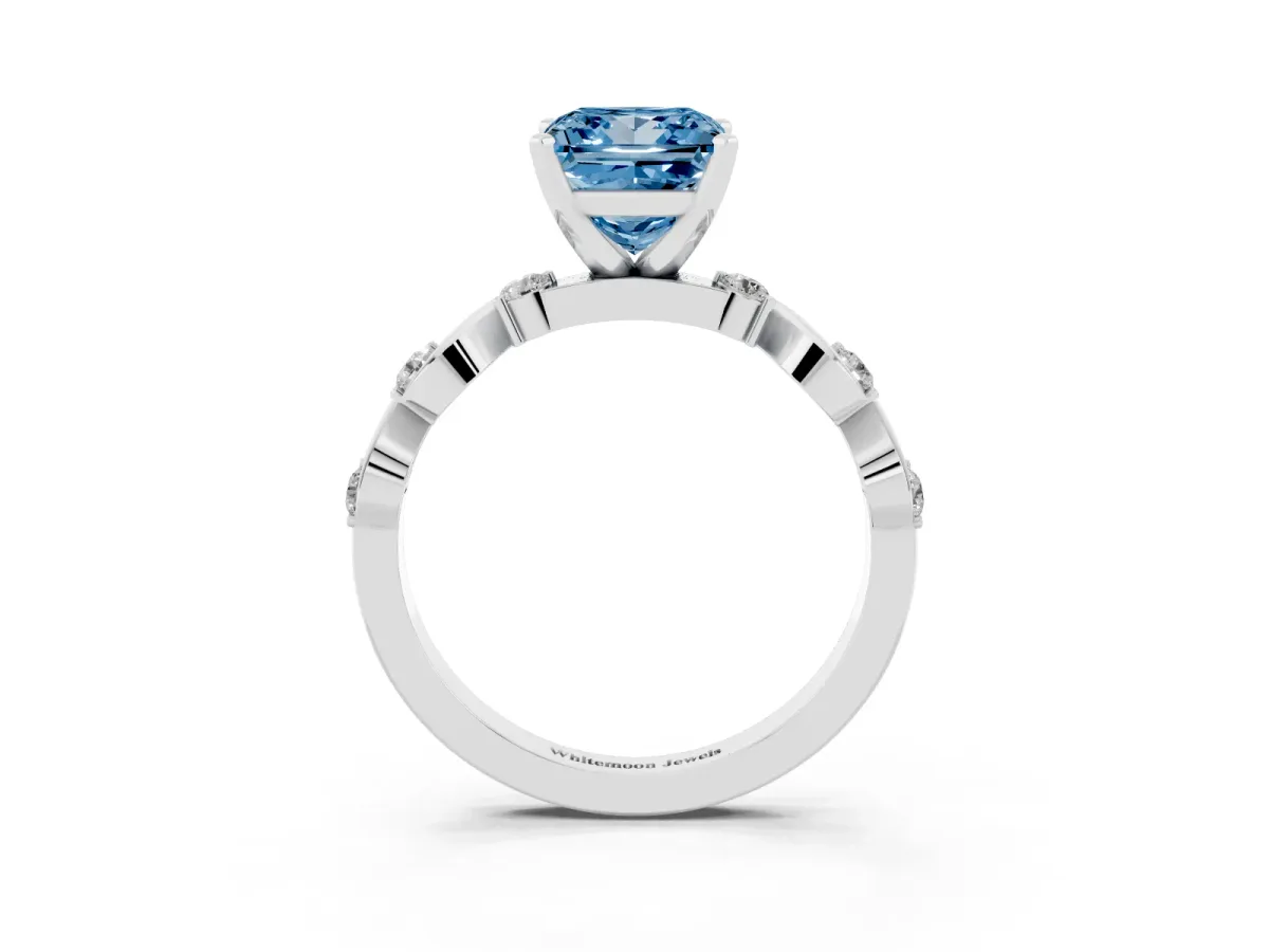Fancy Blue Princess Cut Diamond Solitaire Twisted Band with Round Accents and Prong Setting White gold