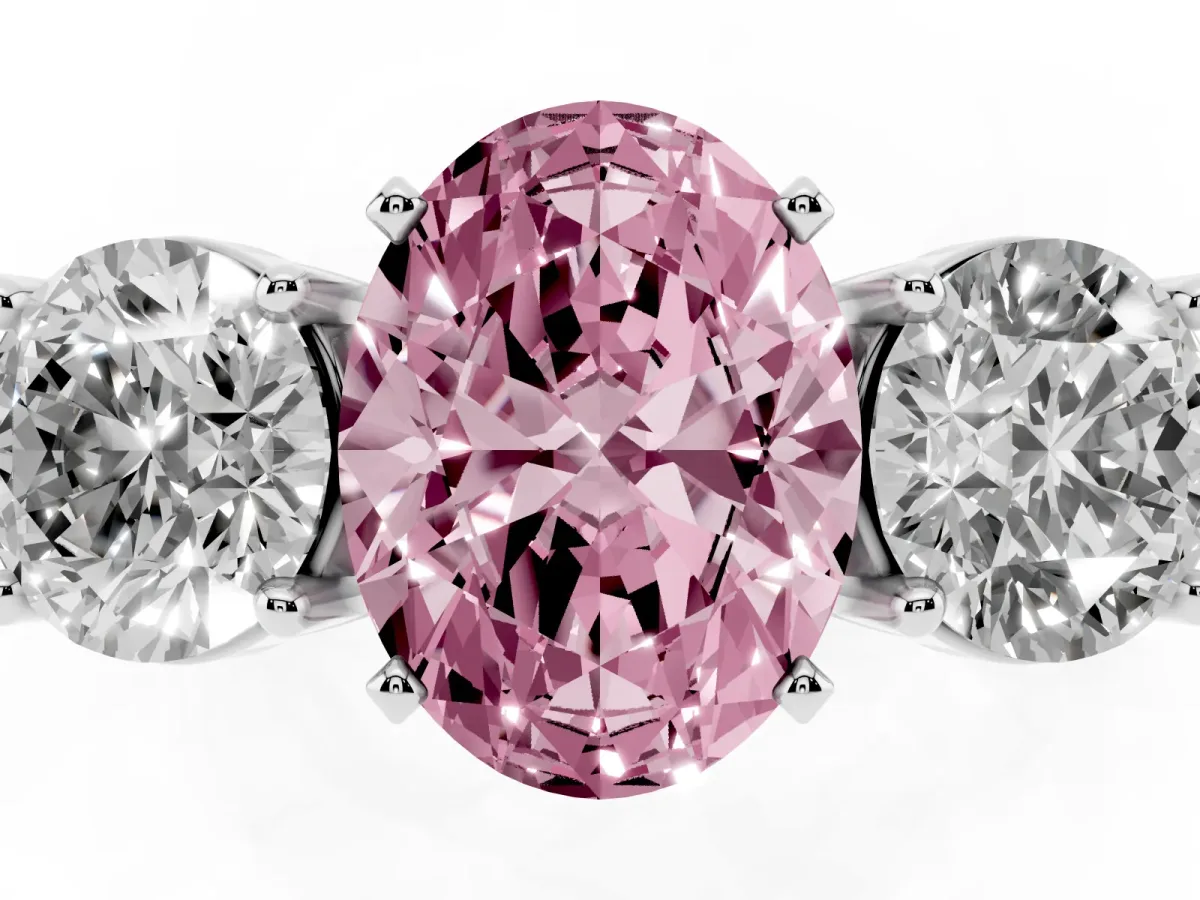 Fancy Pink Three-Stone Oval Cut Diamond Ring with Round Side Stones, Classic Band, and Four-Prong Setting Silver