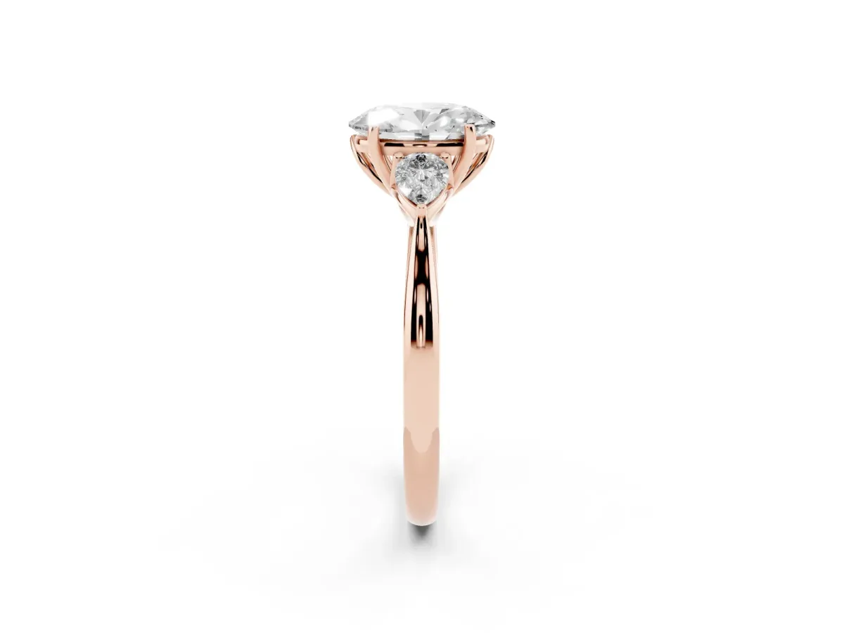 Oval Cut Diamond Three-Stone Ring with Pear Side Stones and Prong Setting Rose gold