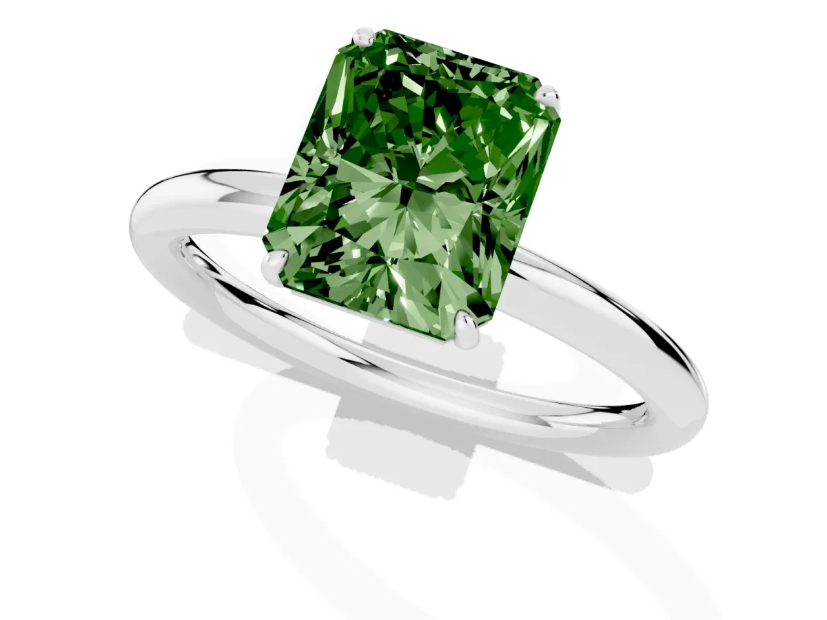 Fancy Green Radiant Cut Solitaire Diamond Ring with Four-Prong Setting on a Plain Band Platinum