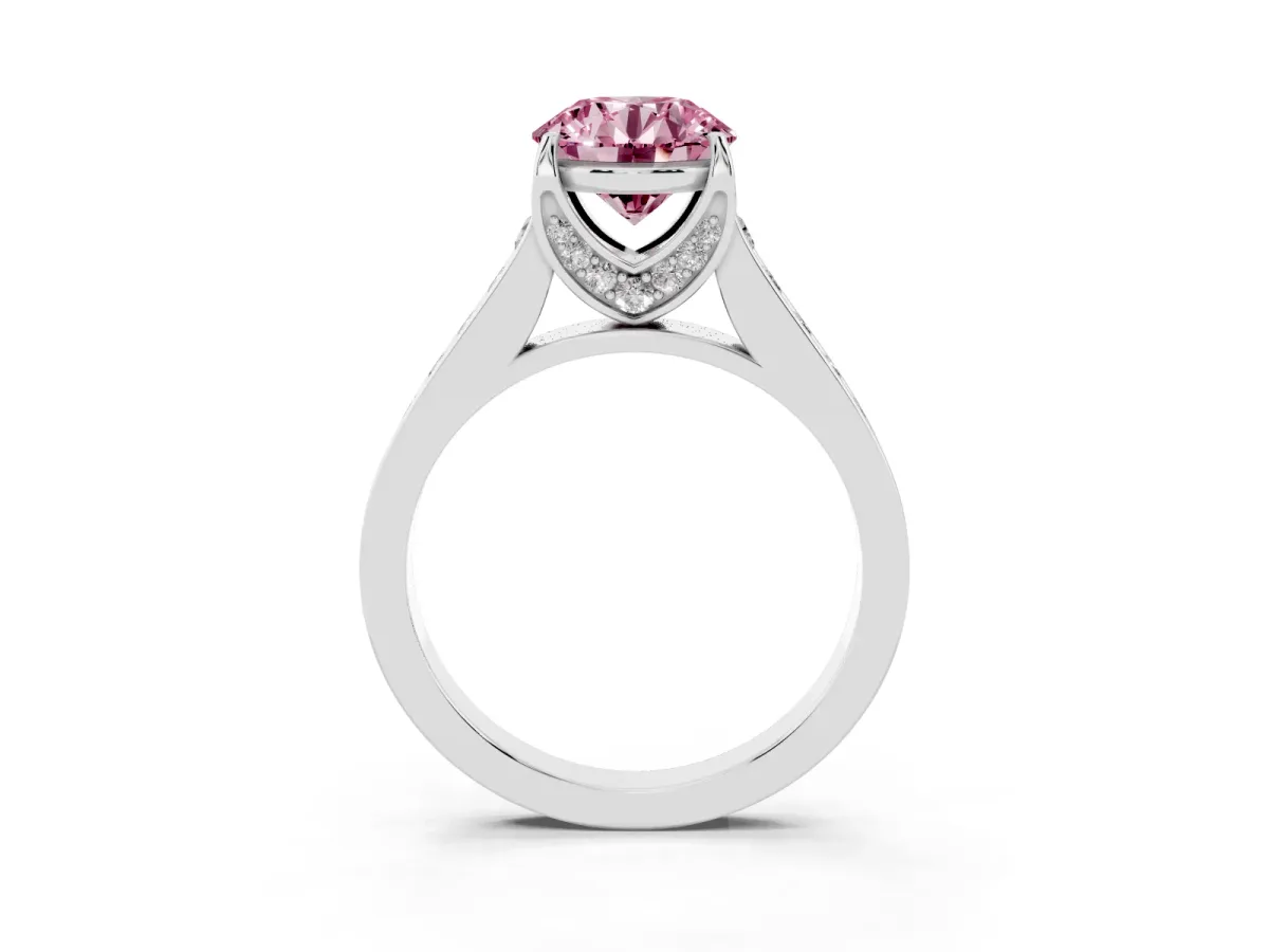 Fancy Pink Round Cut Brilliant Cut Diamond Engagement Ring with Pavé Band and Four-Prong Setting Silver
