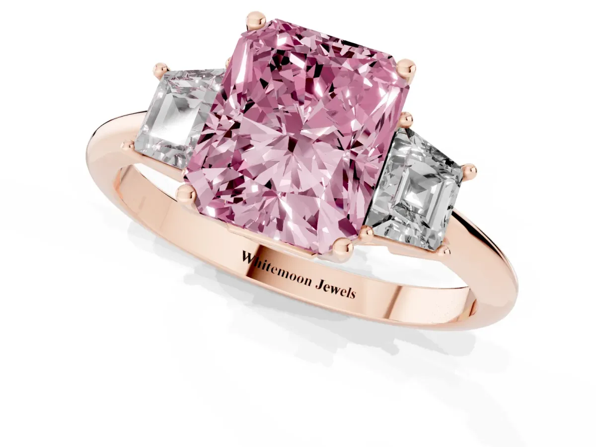 Fancy Pink Radiant Cut Diamond Three-Stone Ring with Trapezoid Side Stones and Prong Setting Rose gold