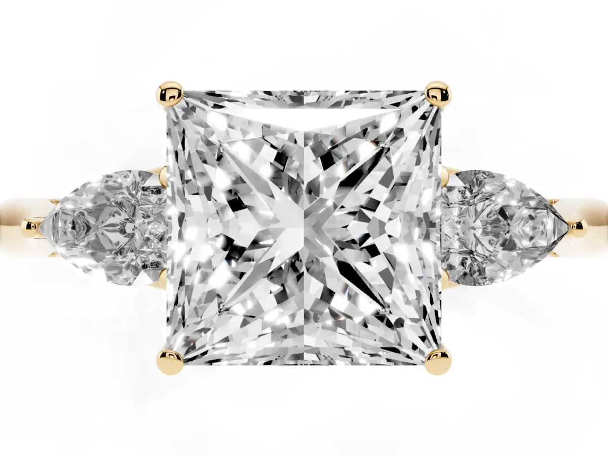 Three-Stone Princess Cut Diamond Ring with Pear Side Stones in Four-Prong Setting Yellow gold