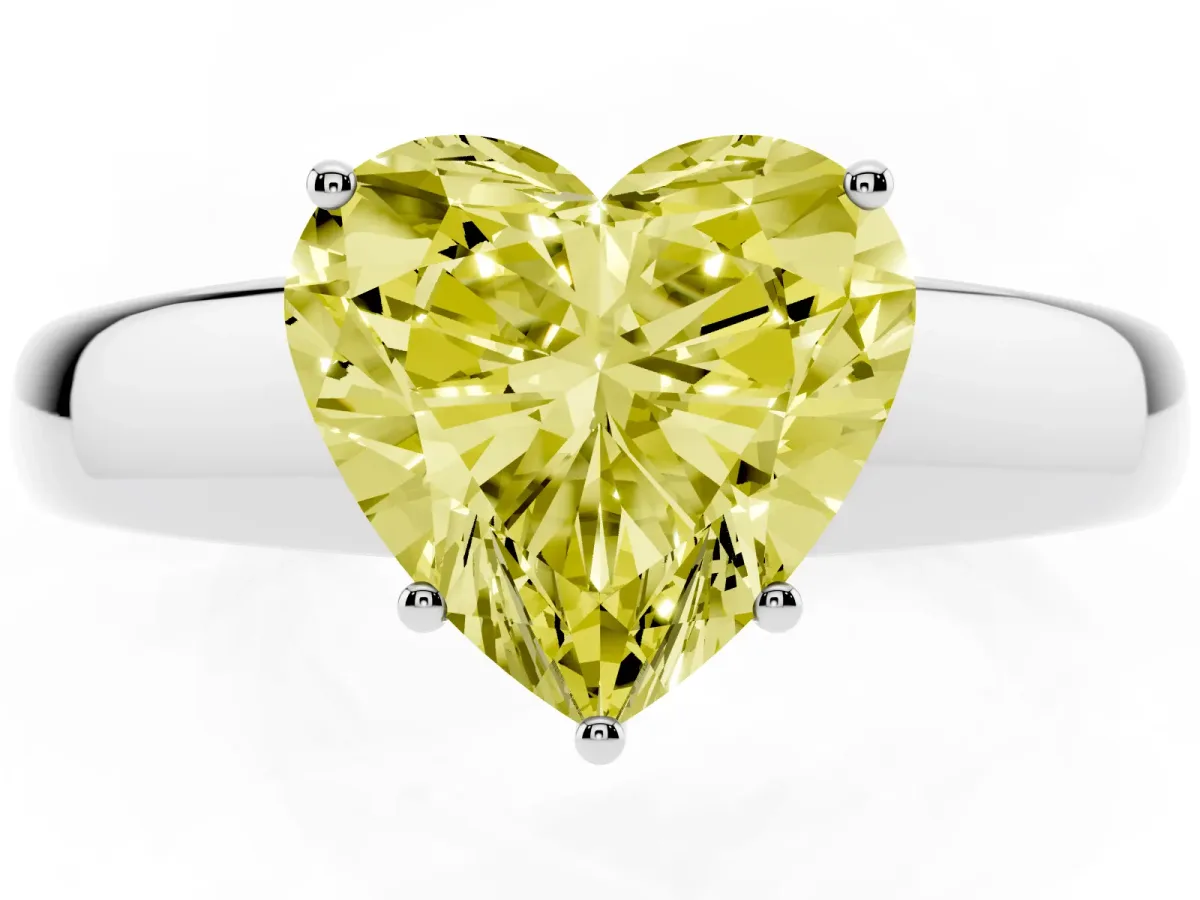 Fancy Yellow Heart Cut Solitaire Diamond Ring with Tapered Band and Four-Prong Setting Silver