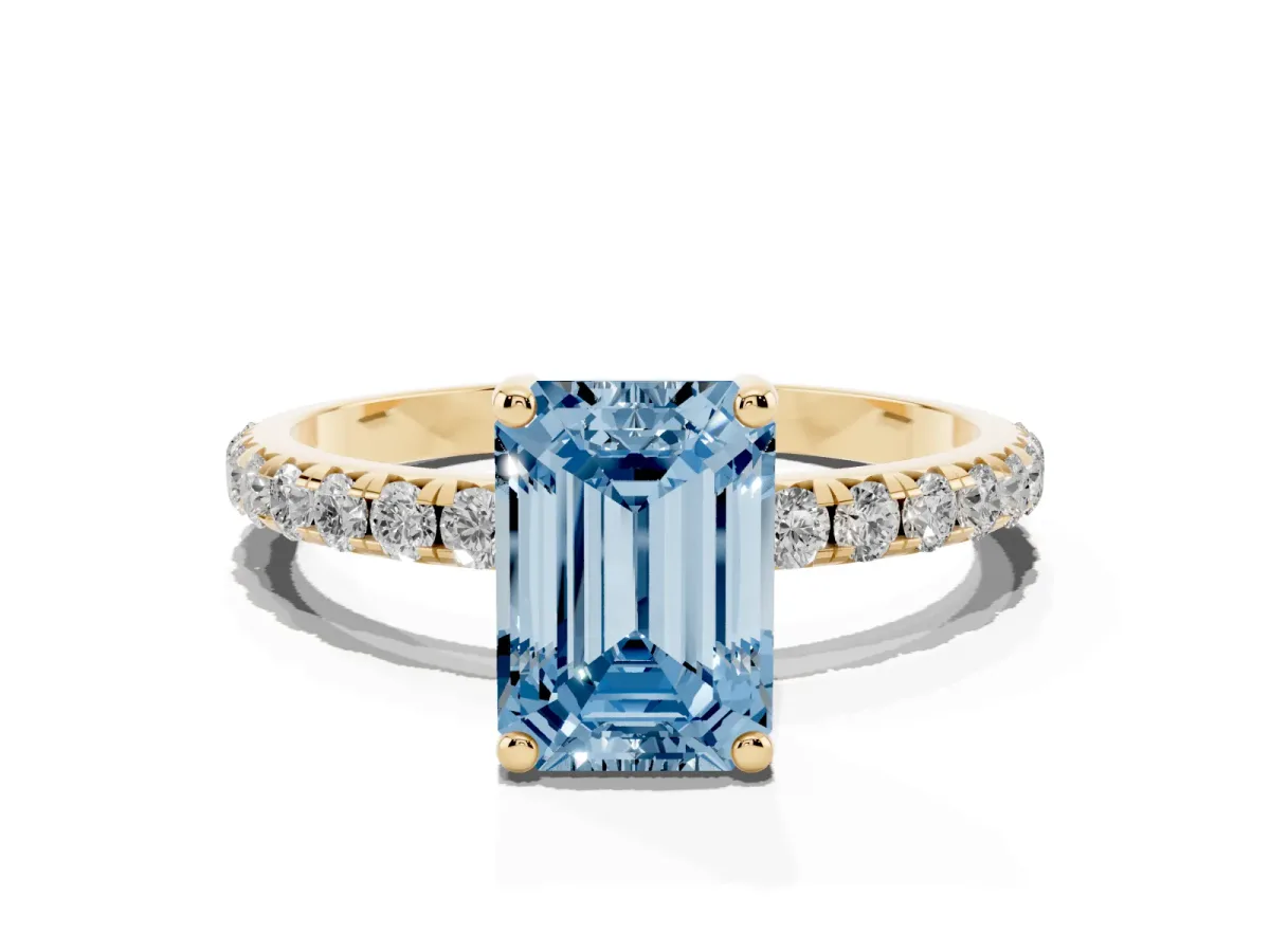 Fancy Blue Emerald Cut Cut Diamond Solitaire Ring with Micro Pave Band and Four Prong Setting Yellow gold
