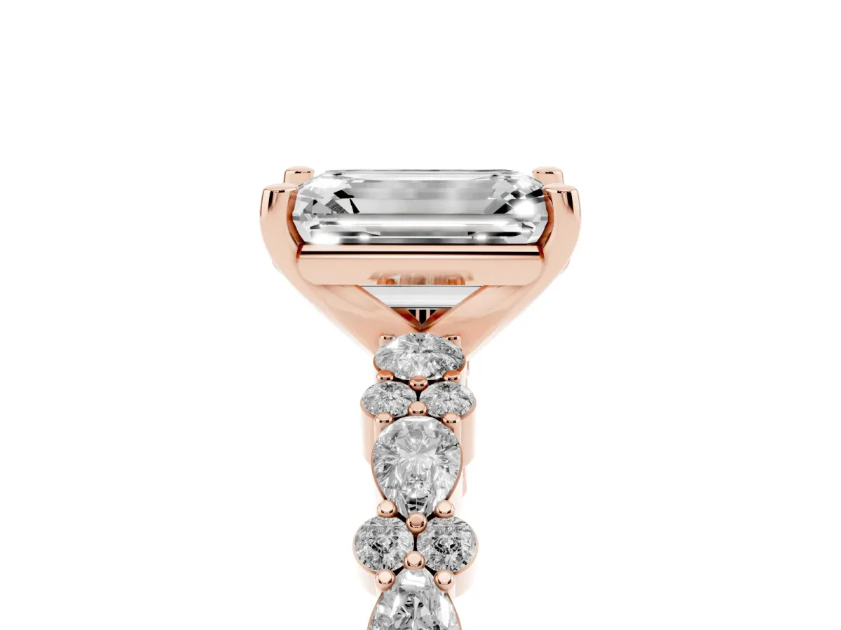 Emerald Cut Diamond Side Stone Solitaire Ring with Round and Four-Prong Setting Rose gold