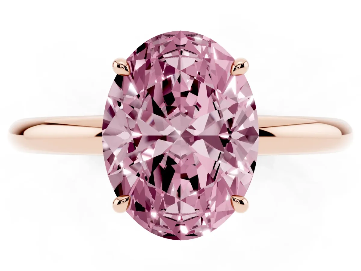 Fancy Pink Oval Cut Diamond Solitaire Ring with Thin Band and Four-Prong Setting Rose gold