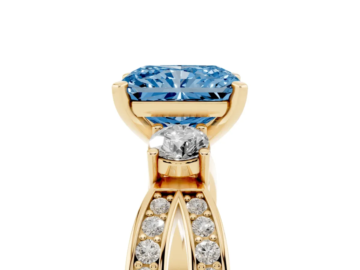 Fancy Blue Three-Stone Radiant Cut Cut Diamond Twist Band with Prong Setting Yellow gold