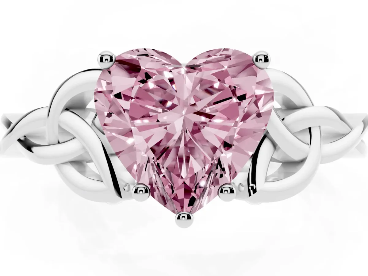 Fancy Pink Heart Cut Diamond Solitaire Engagement Ring with Celtic Knot Band and Four-Prong Setting Platinum