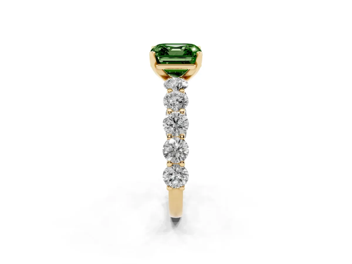 Fancy Green Asscher Cut Diamond Prong Setting with Side Stones on a Pave Band Yellow gold