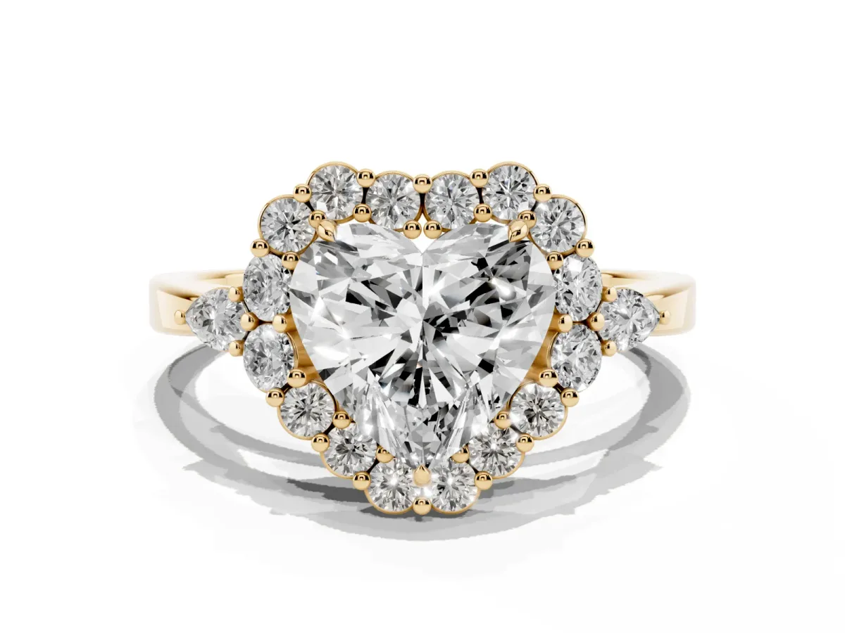Heart Cut Diamond Halo Ring with Pear Side Stones and Prong Setting Yellow gold