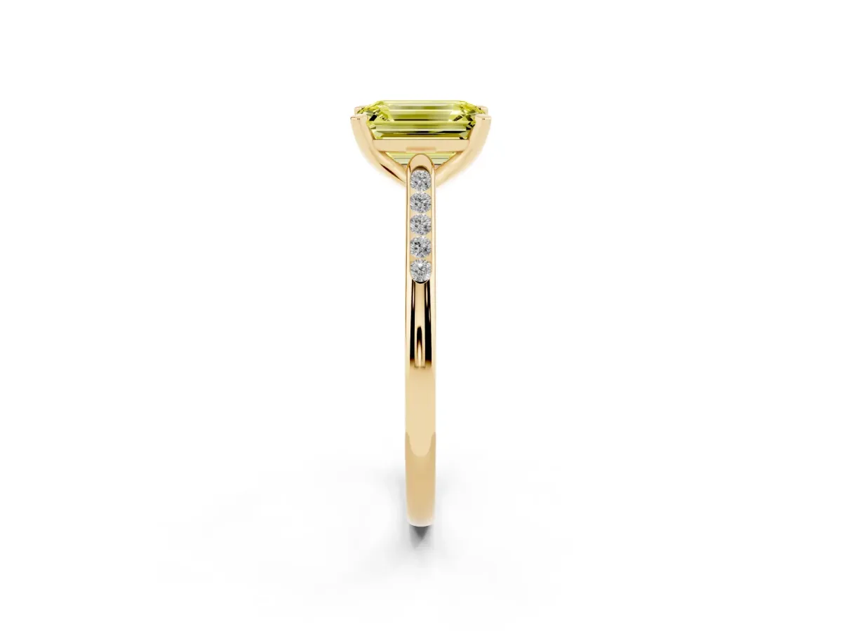 Fancy Yellow Emerald Cut Diamond Solitaire Ring with Channel Set Round Band and Prong Setting Yellow gold