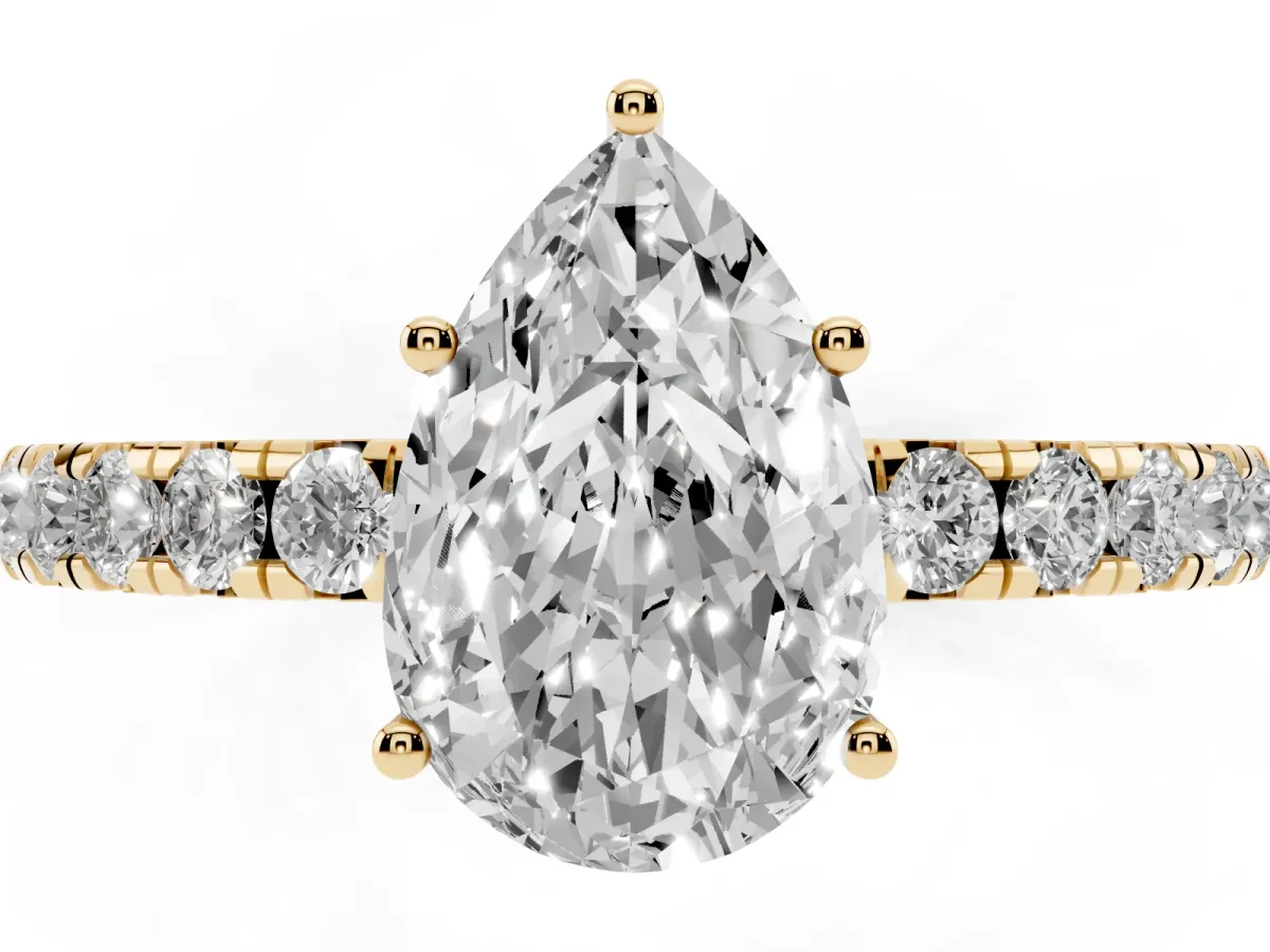 Pear Cut Diamond Pavé Solitaire Engagement Ring with Four-Prong Setting Yellow gold
