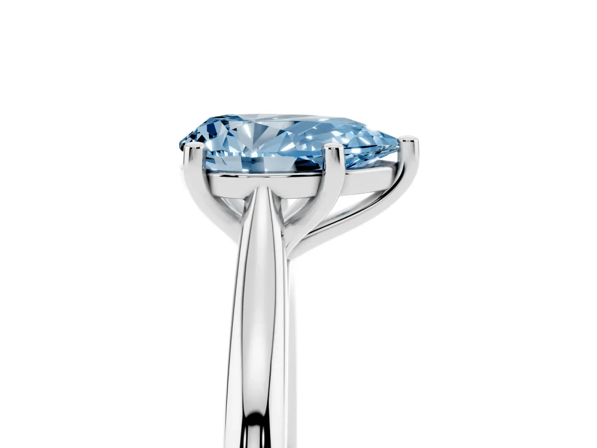Fancy Blue Pear Cut Cut Solitaire Ring with Cathedral Band and Four-Prong Setting Silver