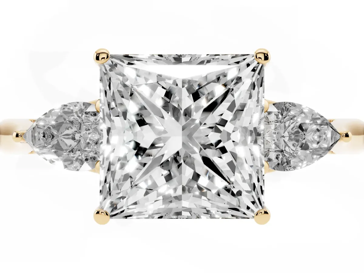 Three-Stone Princess Cut Diamond Ring with Pear Side Stones in Four-Prong Setting Yellow gold