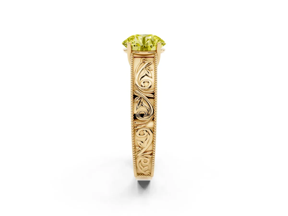 Fancy Yellow Round Cut Diamond Solitaire Ring with Engraved Band and Four-Prong Setting Yellow gold