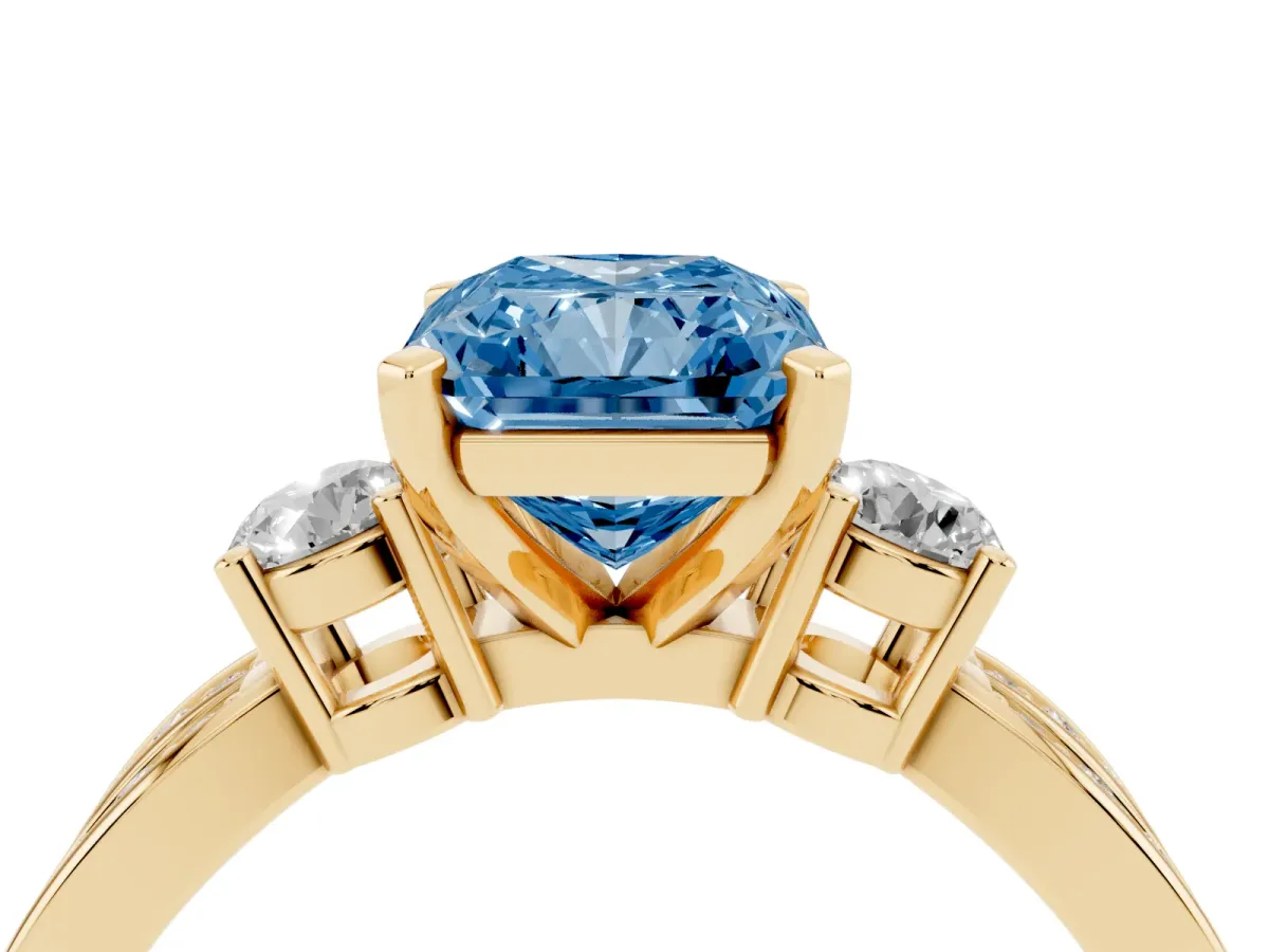 Fancy Blue Three-Stone Radiant Cut Cut Diamond Twist Band with Prong Setting Yellow gold